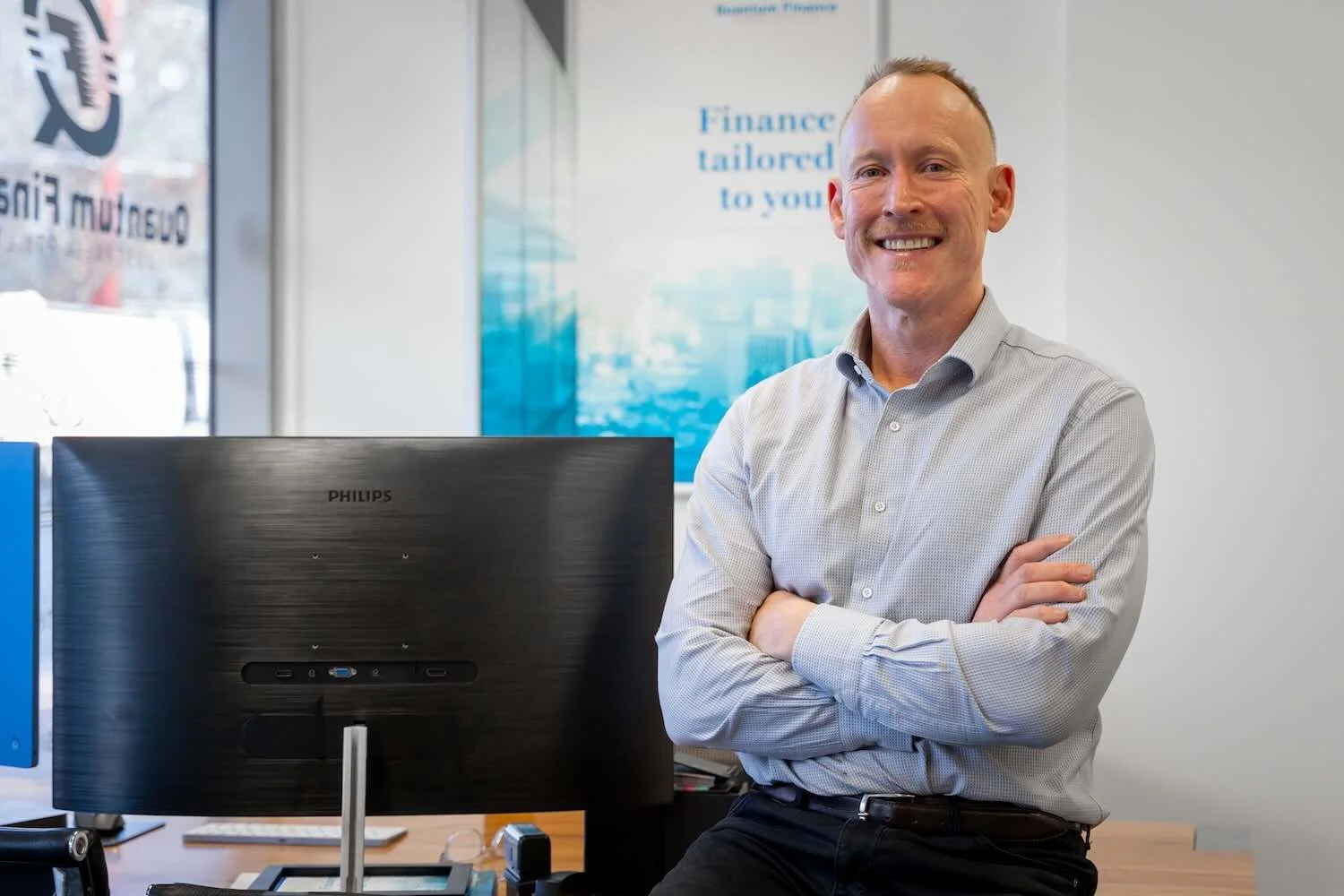Gavin Harrigan, Managing Director of Quantum Finance Australia, at his desk in the West Leederville office