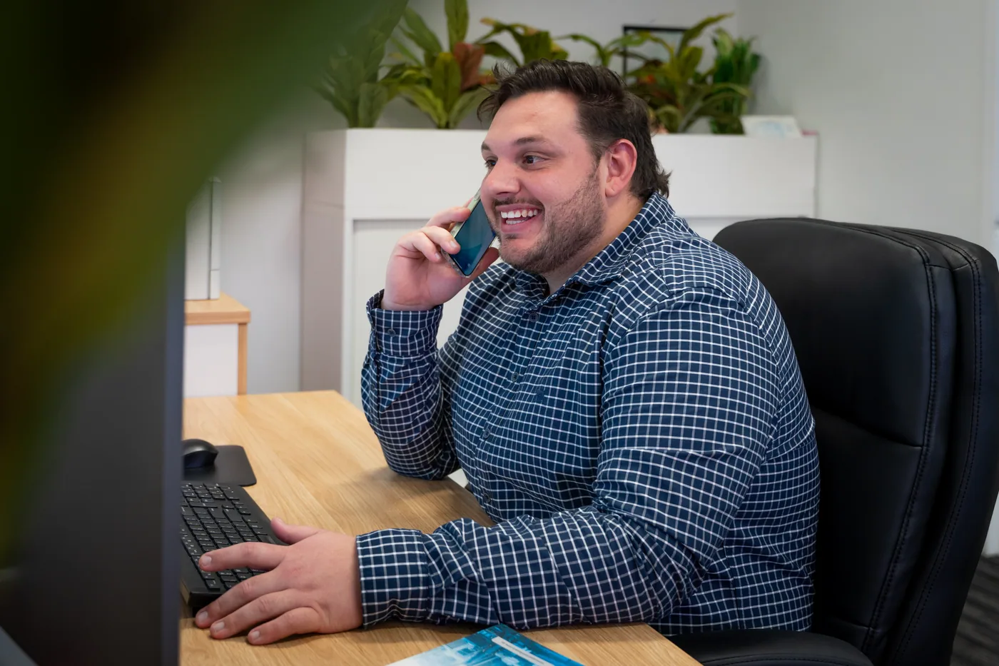A broker talking a client through their pre-approval on the phone
