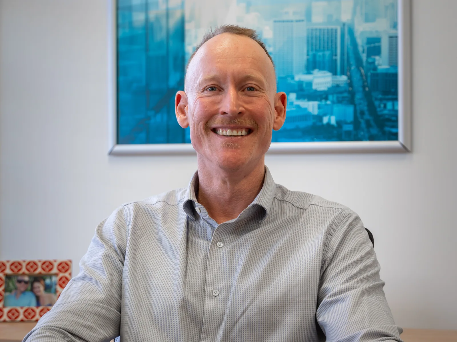 Gavin Harrigan at his desk preparing a commercial lending file